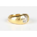 A gold and diamond single stone ring, gypsy set with a cushion cut diamond, detailed '18 2205',