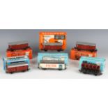 A collection of Märklin gauge HO goods rolling stock, including car transporters, wagons, tankers