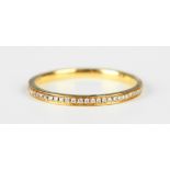 An 18ct gold and diamond full eternity ring, mounted with circular cut diamonds, weight 1.9g, ring