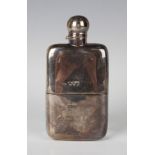 A late Victorian silver hip flask with screw hinged lid and detachable cup, London 1892 by Army &