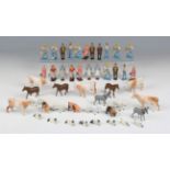 A collection of Crescent Toys lead figures of farm workers, animals and accessories, including a