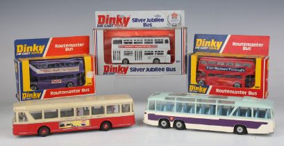 A collection of Dinky Toys and Supertoys vehicles and accessories, including a No.15 railway signals