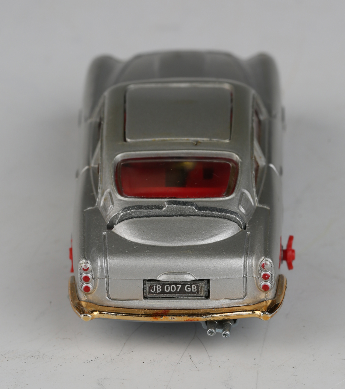 A Corgi Toys No. 270 The New James Bond Aston Martin, silver, with revolving number plates, tyre- - Image 6 of 11