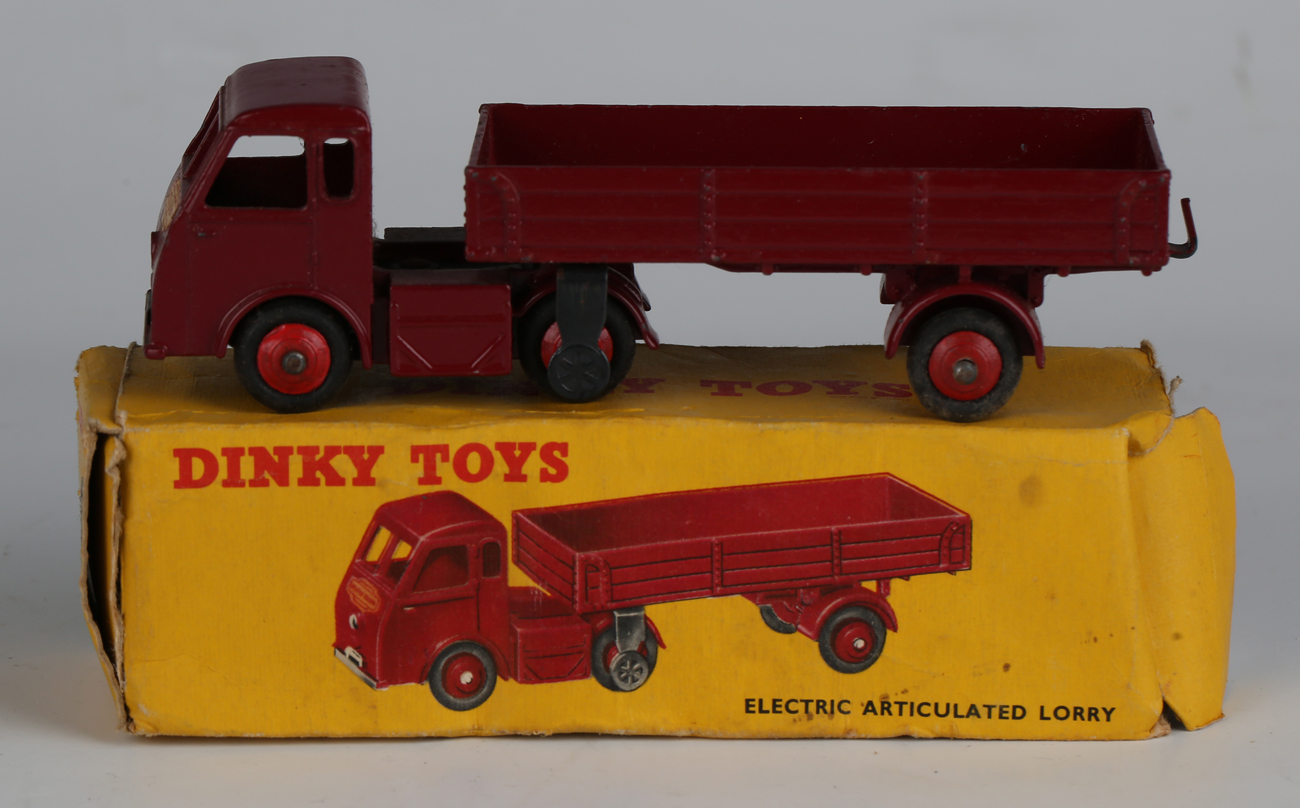 Seven Dinky Toys, comprising No. 420 forward control lorry, red with green wheels, No. 253 Daimler - Image 7 of 8