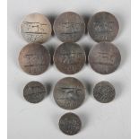 A set of six Edwardian silver circular buttons and three matching smaller buttons, each front