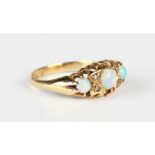 An 18ct gold, opal and diamond ring, mounted with three opals alternating with two pairs of rose cut