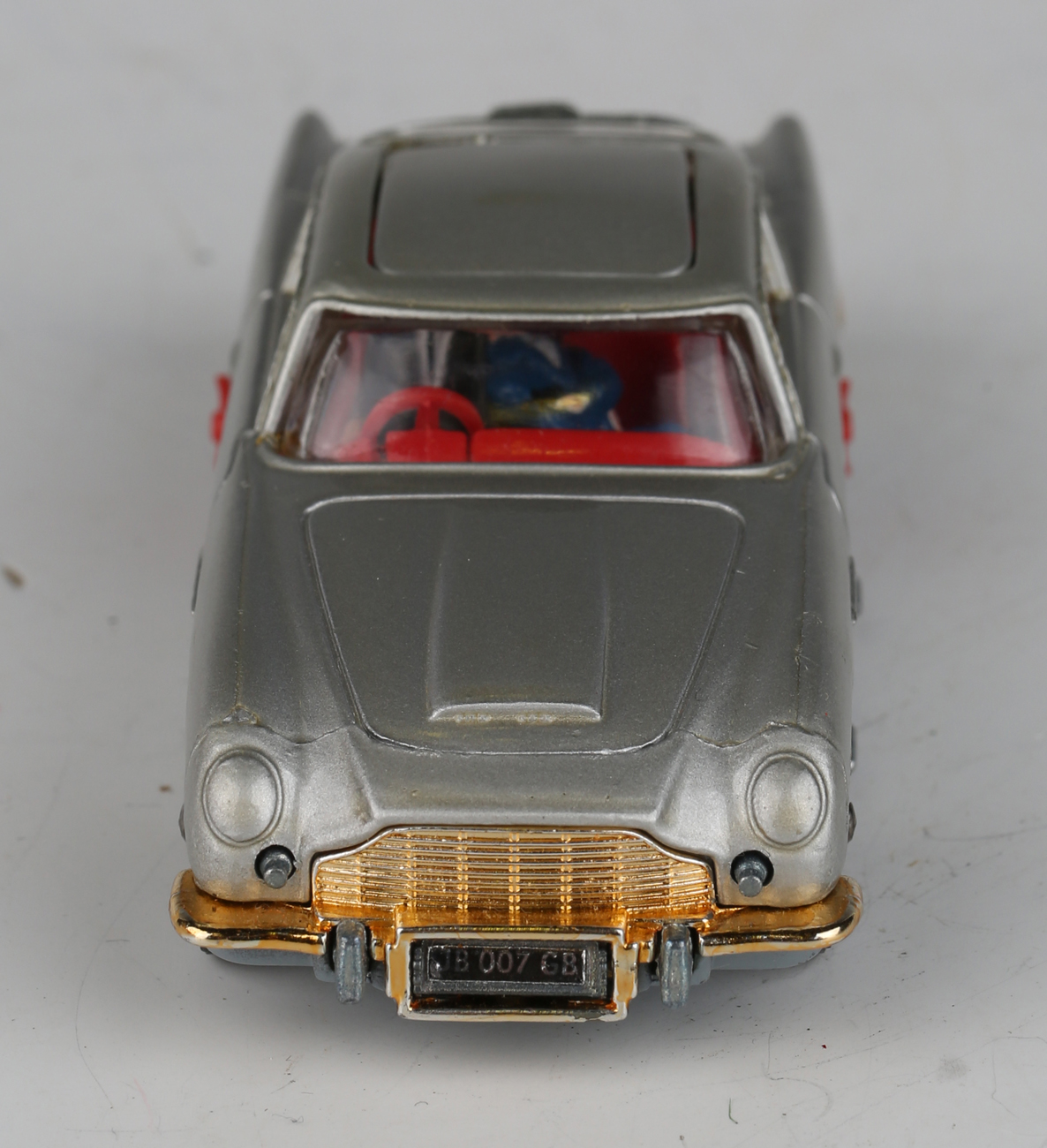 A Corgi Toys No. 270 The New James Bond Aston Martin, silver, with revolving number plates, tyre- - Image 8 of 11