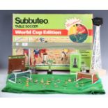 A collection of Subbuteo, including various teams, goals, trophies, scoreboard and pitch, boxed (