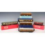 A collection of Hornby Dublo two and three-rail coaches, including Pullman, WR, LNER and LMS, some