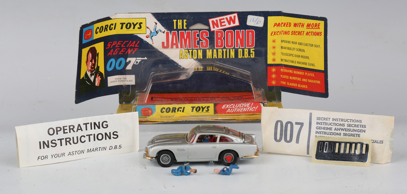 A Corgi Toys No. 270 The New James Bond Aston Martin, silver, with revolving number plates, tyre-