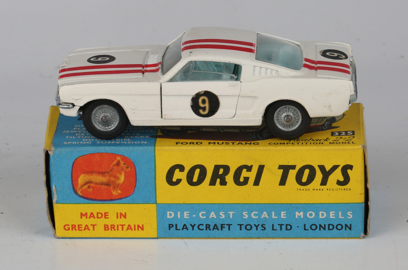 A small collection of Corgi Toys vehicles, comprising No. 325 Ford Mustang Fastback 2+2 - Image 7 of 11