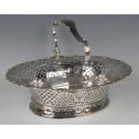 A George II silver oval cake basket with foliate capped scroll swing handle, the pierced sides