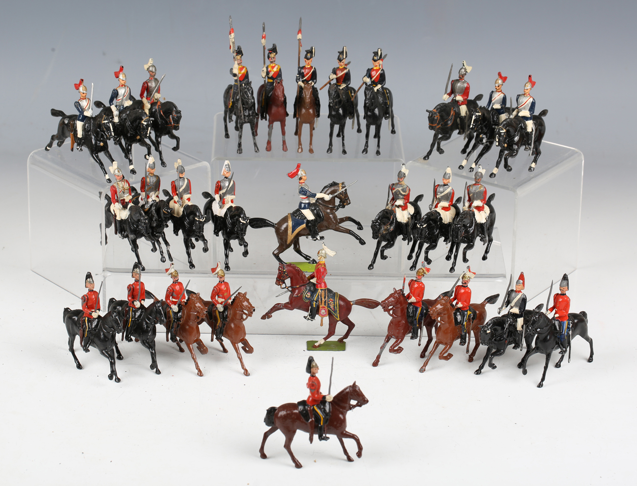 A collection of Britains lead soldiers, including lancers, Life Guards and a No. 66 13th Duke of