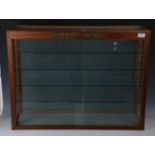 A Hornby Dublo oak and glazed shop display cabinet, fitted with four shelves and sliding doors,
