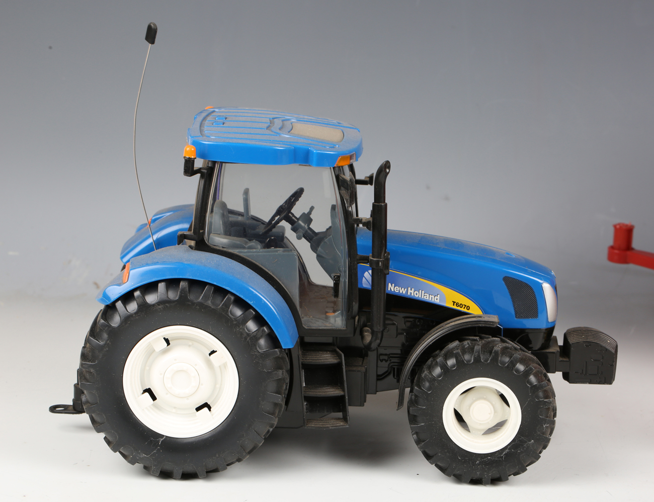 A Britains Big Farm radio control New Holland T6070 tractor and a bulk tipping trailer, both - Image 11 of 15