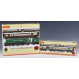 A Hornby gauge OO R.2369 The Golden Arrow train pack and an R.4196 The Golden Arrow coach pack,