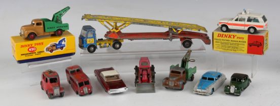 A collection of Dinky Toys vehicles and accessories, including a No. 430 breakdown lorry, boxed, a