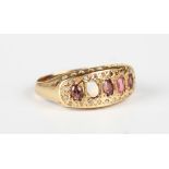 An 18ct gold, diamond and pink gem set ring, Birmingham 1919, weight 3g, ring size approx J (some