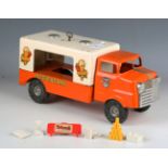 A Tri-ang pressed steel ice cream van, finished in white and orange, with keywind musical chimes,