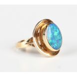 A gold ring, mounted with an oval opal doublet, detailed '14ct', weight 5.4g, ring size approx M.