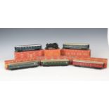 A small collection of Märklin gauge HO railway items, comprising locomotive 44690 with smoke