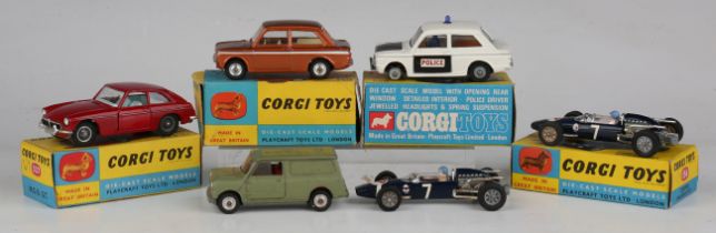 Four Corgi Toys cars, comprising No. 506 Police Panda Imp, No.251 Hillman Imp, bronze, No. 327 MGB