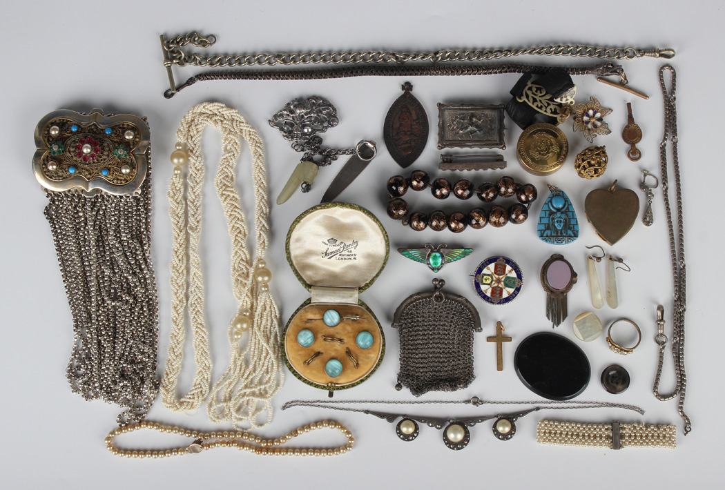 A group of jewellery, including a Charles Horner silver and enamelled brooch, designed as winged
