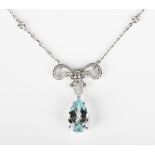 A white gold, aquamarine and diamond pendant necklace, the tied ribbon bow motif mounted with