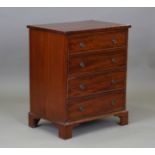 An early 20th century mahogany chest of four graduated long drawers, on bracket feet, height 77cm,