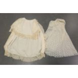 A group of late 19th and early 20th century clothing, including linen christening gowns, adult night