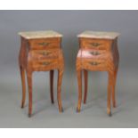A pair of mid/late 20th century French kingwood and foliate inlaid bedside chests of bombé form,