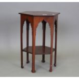 An early 20th century 'Moorish' mahogany hexagonal occasional table, probably by Liberty & Co,