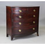 A Regency mahogany bowfront chest of drawers with pressed brass handle plates, height 108cm, width