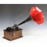 An Edison Standard phonograph, fitted with a black and gilt painted horn and with extra aluminium