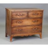 A late George III mahogany chest of two short and two long drawers, on bracket feet, height 82cm,