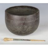 A 19th century Tibetan patinated bronze singing bowl, height 20cm, diameter 28cm.Buyer’s Premium
