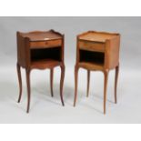 Two similar 20th century French oak bedside cabinets with galleried tops and single drawers,