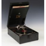 An HMV portable mechanical gramophone with No. 4 soundbox and black rexine case, width 29cm,