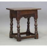 An Elizabeth I oak joint stool, circa 1600, the single-piece rectangular seat above delicate