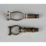 A late 19th/early 20th century nickel plated brass combination cartridge extractor, whistle and