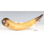 An early 19th century cow horn powder flask with engraved decoration, the body detailed with a