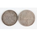 A Charles II half-crown 1677 and a James II half-crown 1686.Buyer’s Premium 29.4% (including VAT @