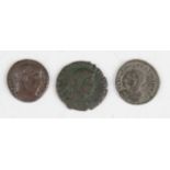 A collection of ancient bronze coinage, including a group of Roman coins, including an AE