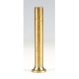 A 19th century gilt brass gravity powder and shot measure of cylindrical form, length 10.5cm.Buyer’s