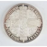 A silver circular medallion, designed as a Victoria Gothic crown 1847, with proof and matt proof