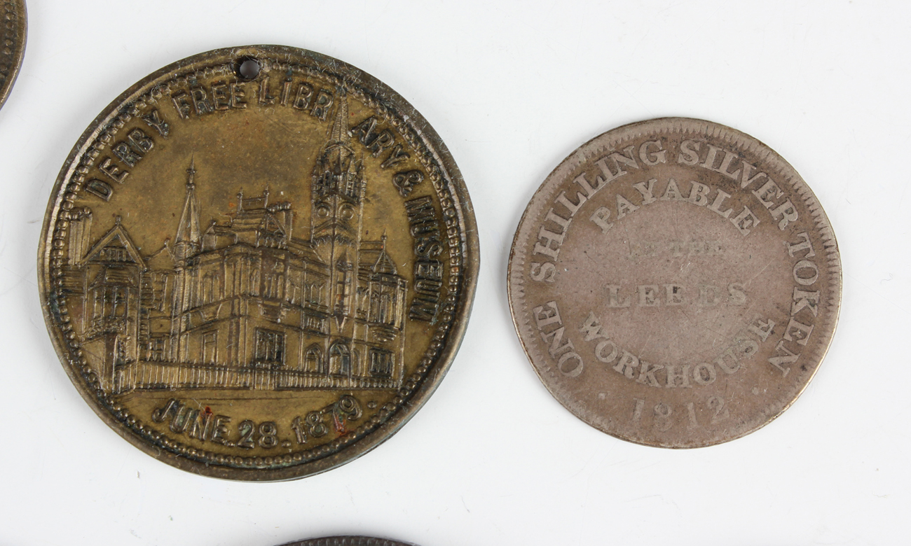 A collection of various 18th, 19th and 20th century tokens and medallions, including a small group