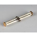 A rare Victorian ivory mounted nickel game shooting counter of square form, length 13.5cm, each of