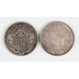 A George IV half-crown 1823 and a George IV half-crown 1828.Buyer’s Premium 29.4% (including VAT @