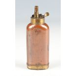 An early 19th century copper and brass three-way pistol powder flask, the base with double-