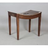 A George III mahogany stool, the curved seat with pierced centre, on square tapering legs, height